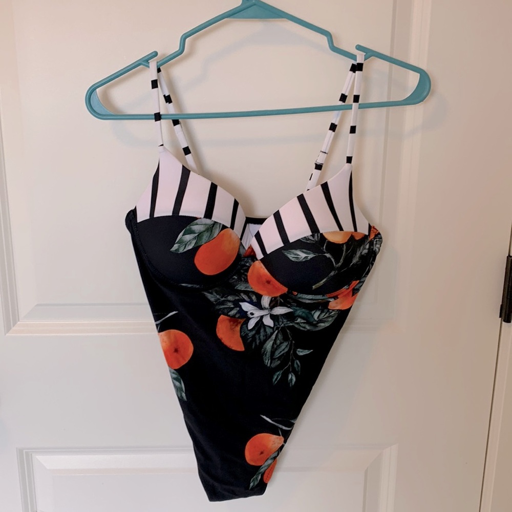 Brand new, never been worn, swim suit with cups